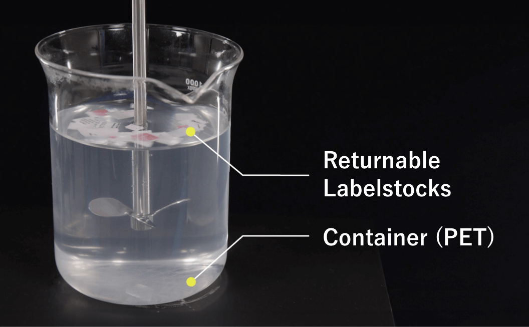 Efficient label collection and removal with specific gravity separation